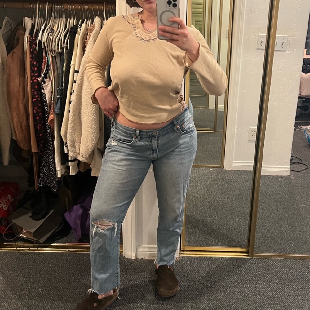 Tan Sweater and Light Blue Jeans